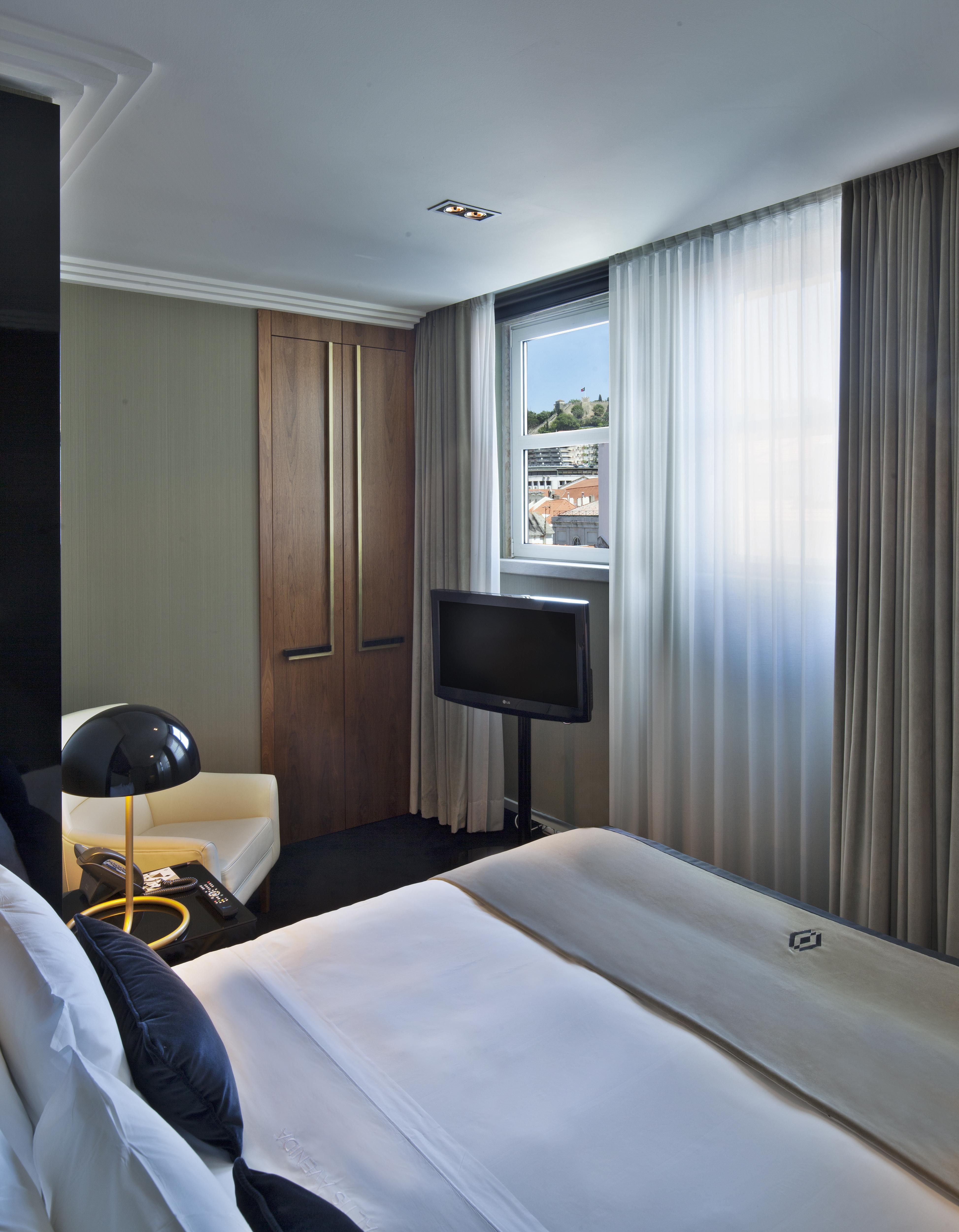 Altis Avenida Hotel Lisbon Exterior photo A room at the hotel
