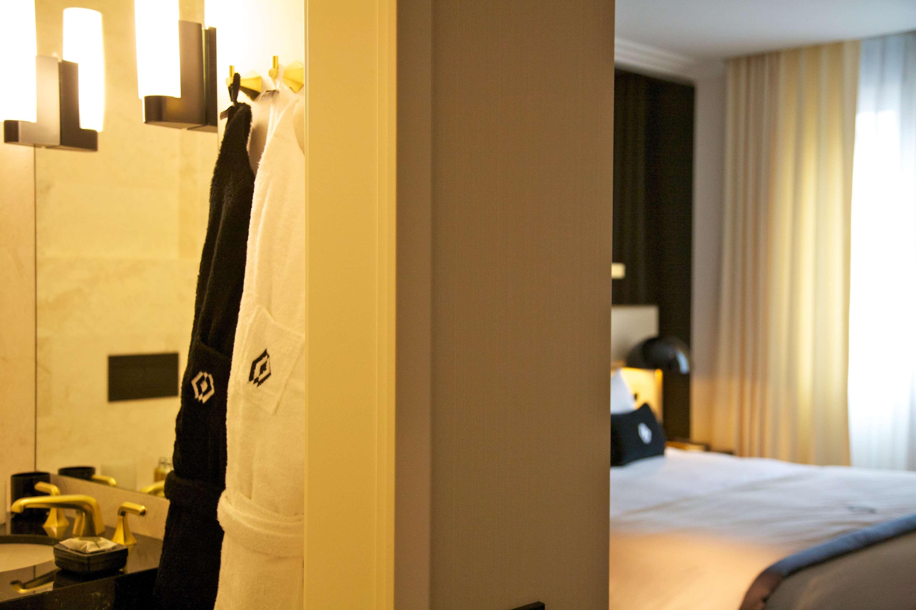 Altis Avenida Hotel Lisbon Exterior photo A bathrobe hanging on a wall